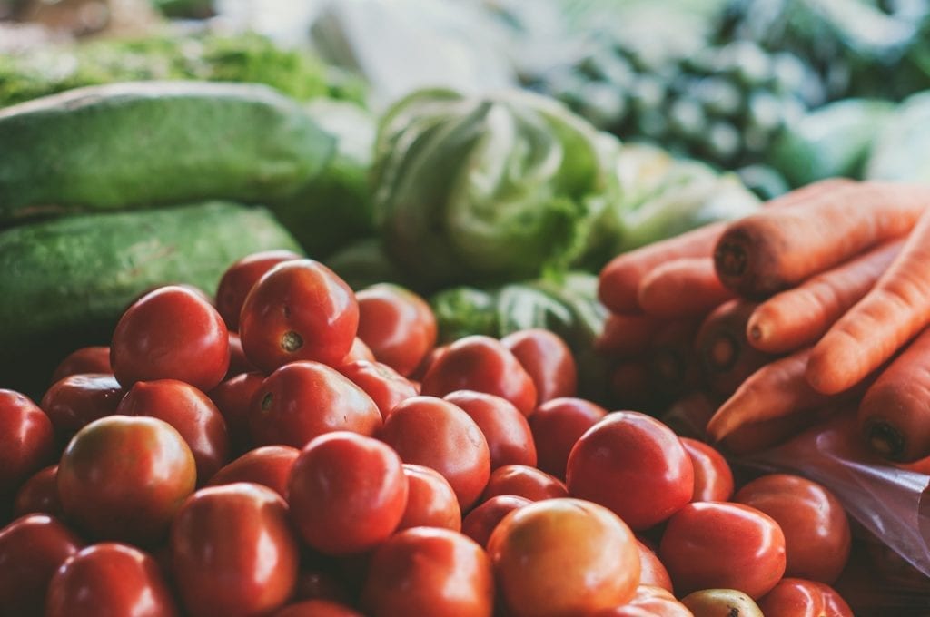fresh stacked veggies closeup at a market; highlighting treating adhd naturally