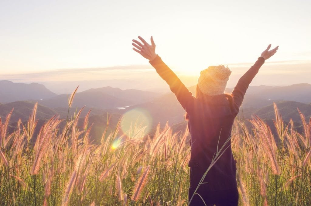 A person feeling great after experiencing the health benefits of the ketogenic diet.