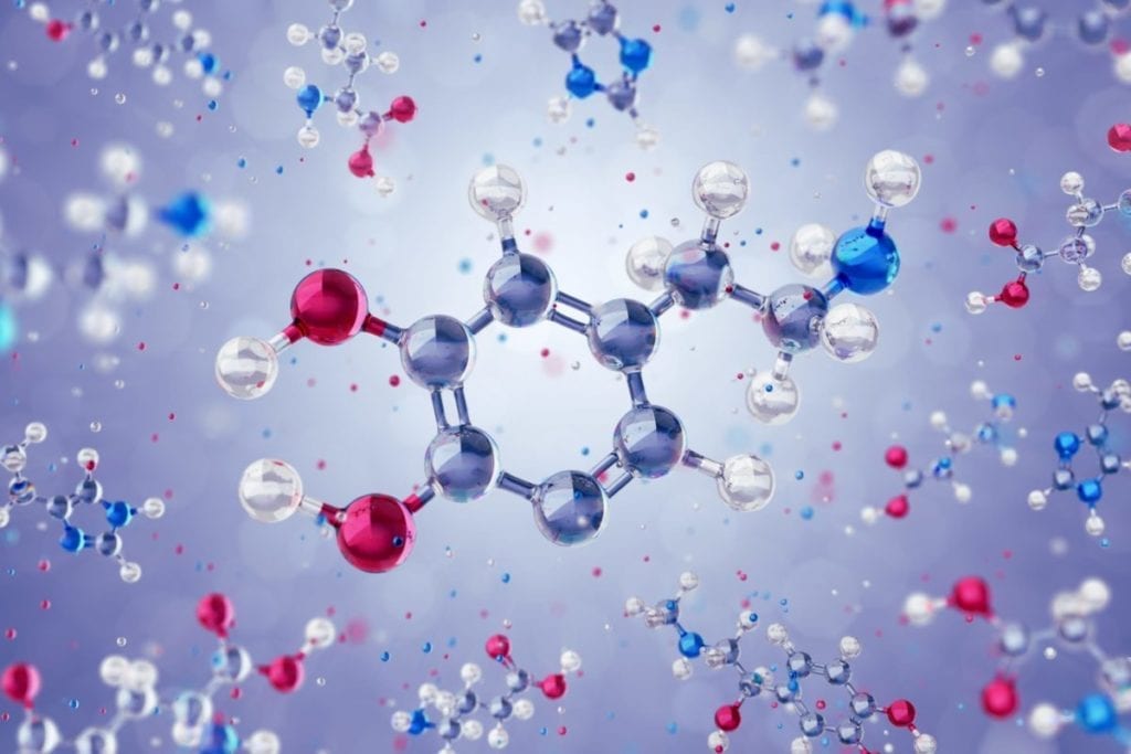 an illustrated molecule of dopamine; highlighting the treatment of winter blues with massage therapy